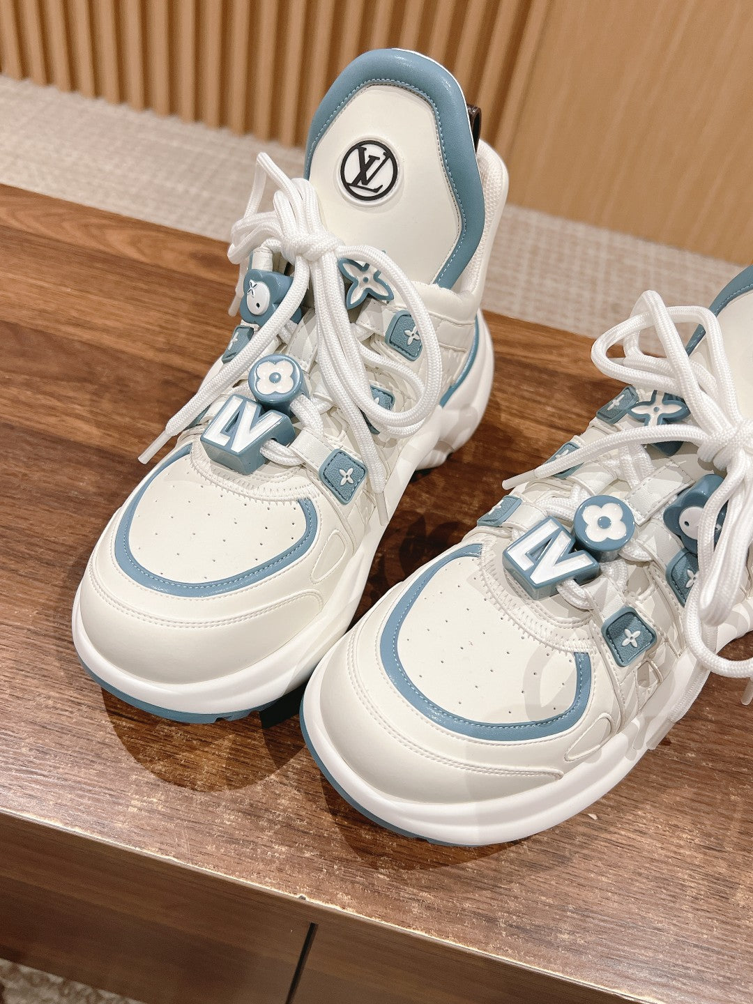 LV ARCHLIGHT SNEAKER IN WHITE MIX SKY BLUE EMBOSSED CALFSKIN
