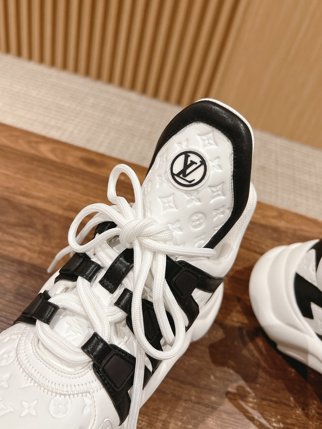 LV ARCHLIGHT SNEAKER IN WHITE MIX BLACK EMBOSSED CALFSKIN