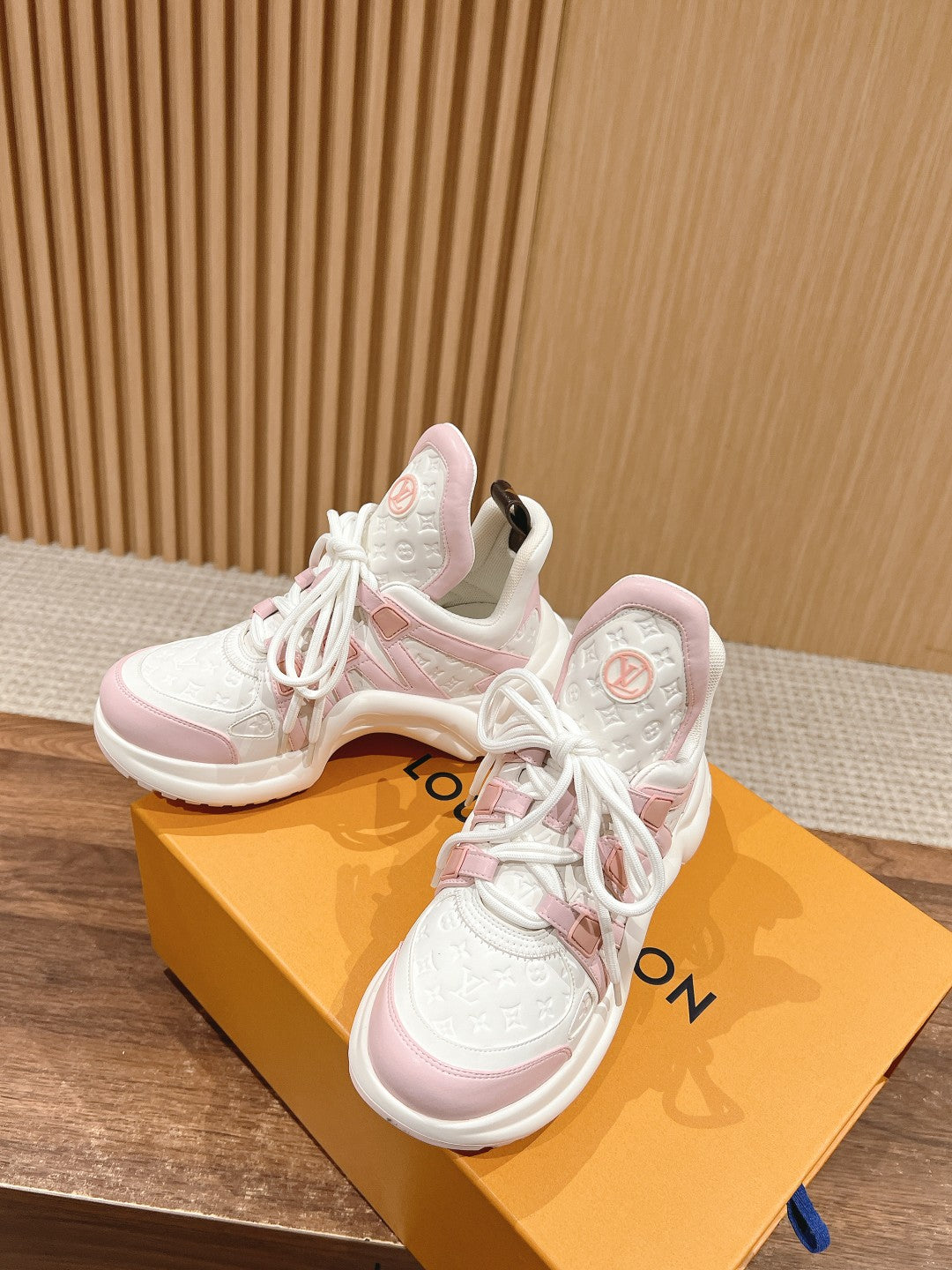 LV ARCHLIGHT SNEAKER IN WHITE MIX BABY PINK EMBOSSED CALFSKIN