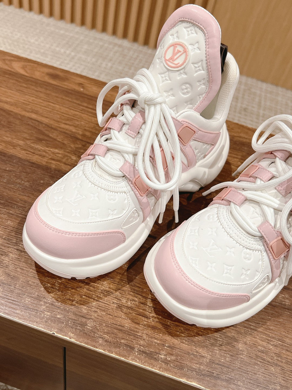 LV ARCHLIGHT SNEAKER IN WHITE MIX BABY PINK EMBOSSED CALFSKIN