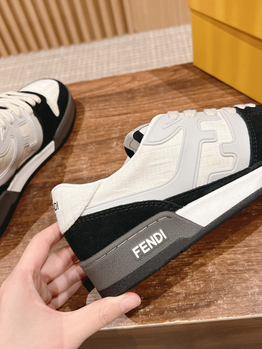 FENDI MATCH TRAINER IN BLACK MIX WHITE CALFSKIN AND HIGH-DENSIITY FABRIC