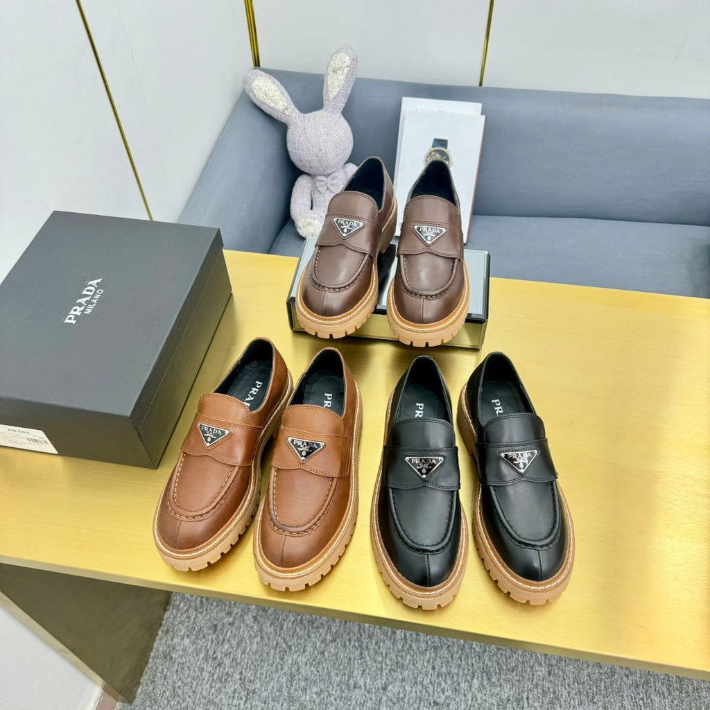 LOAFER WITH TRIANGLE LOGO IN CHOCOLATE BROWN CALFSKIN