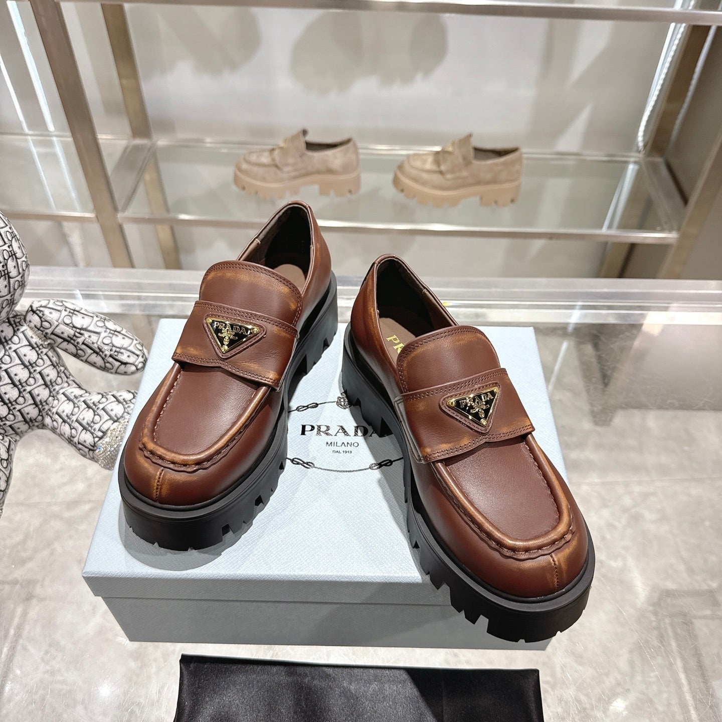 PRADA 25S THICK-SOLE LOAFERS 60 MM IN BROWN SMOOTH CALFSKIN