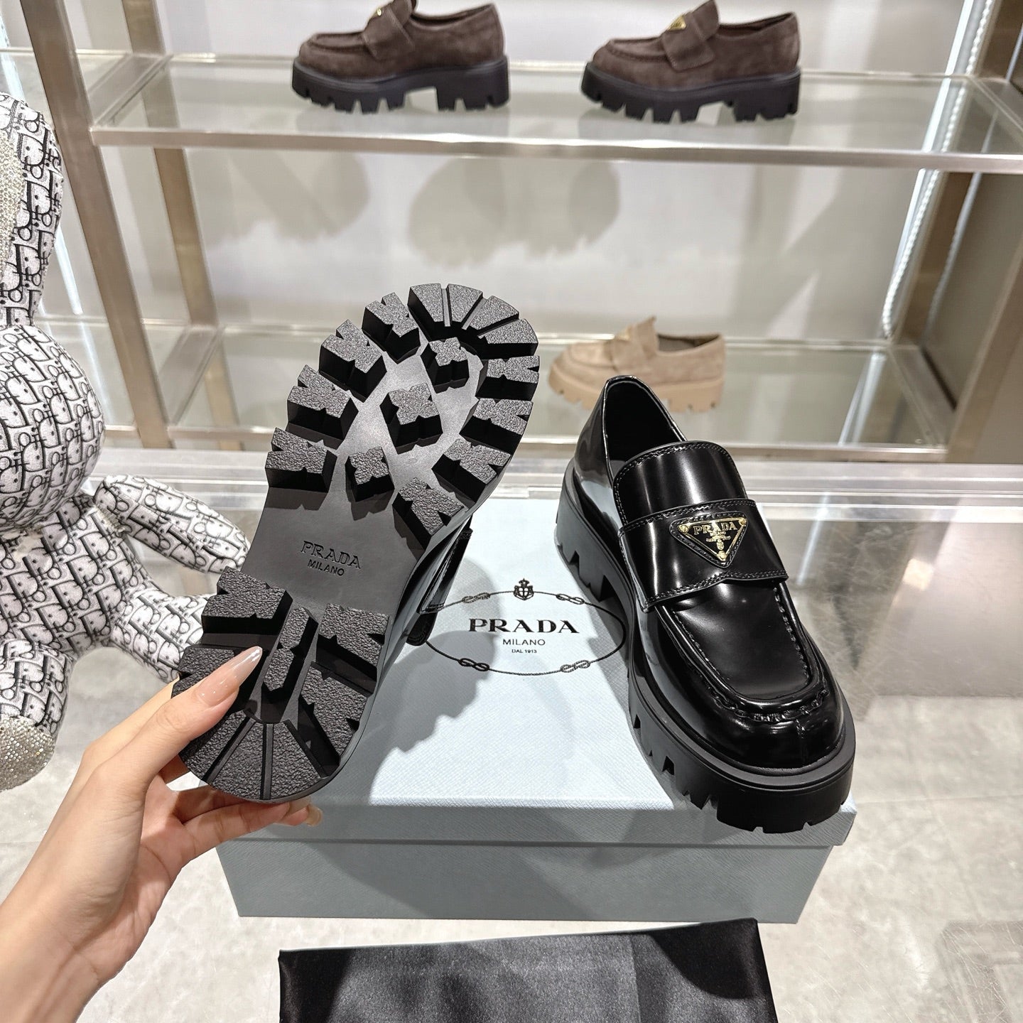 PRADA 25S THICK-SOLE LOAFERS 60 MM IN BLACK CALFSKIN