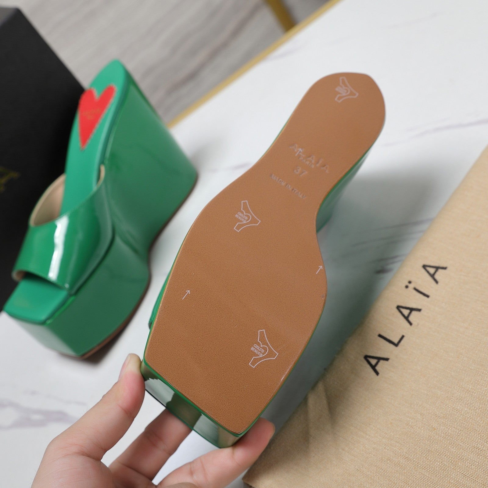 ALAIA PLATFORM WEDGE IN COOL GREEN LAMBSKIN WITH RED HEART