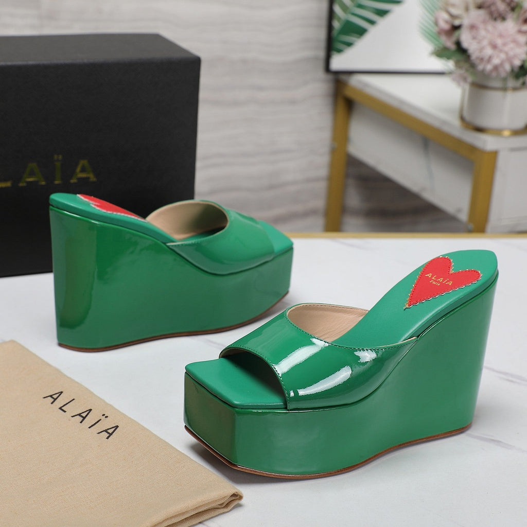ALAIA PLATFORM WEDGE IN COOL GREEN LAMBSKIN WITH RED HEART