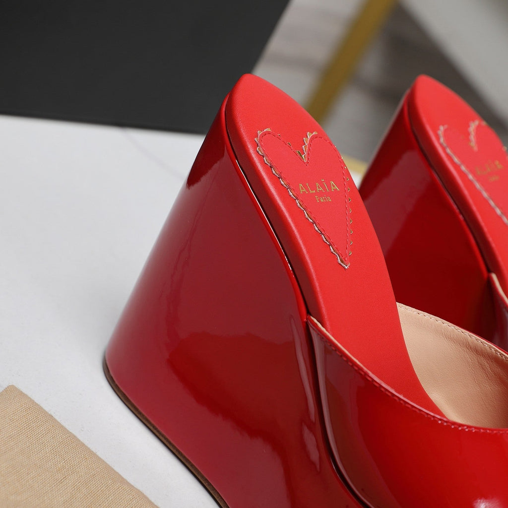 ALAIA PLATFORM WEDGE IN CHERRY RED LAMBSKIN WITH HEART EMBROIDERED