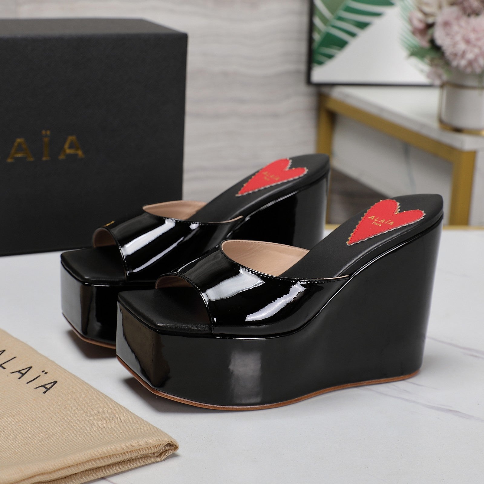 ALAIA PLATFORM WEDGE IN BLACK LAMBSKIN WITH RED HEART