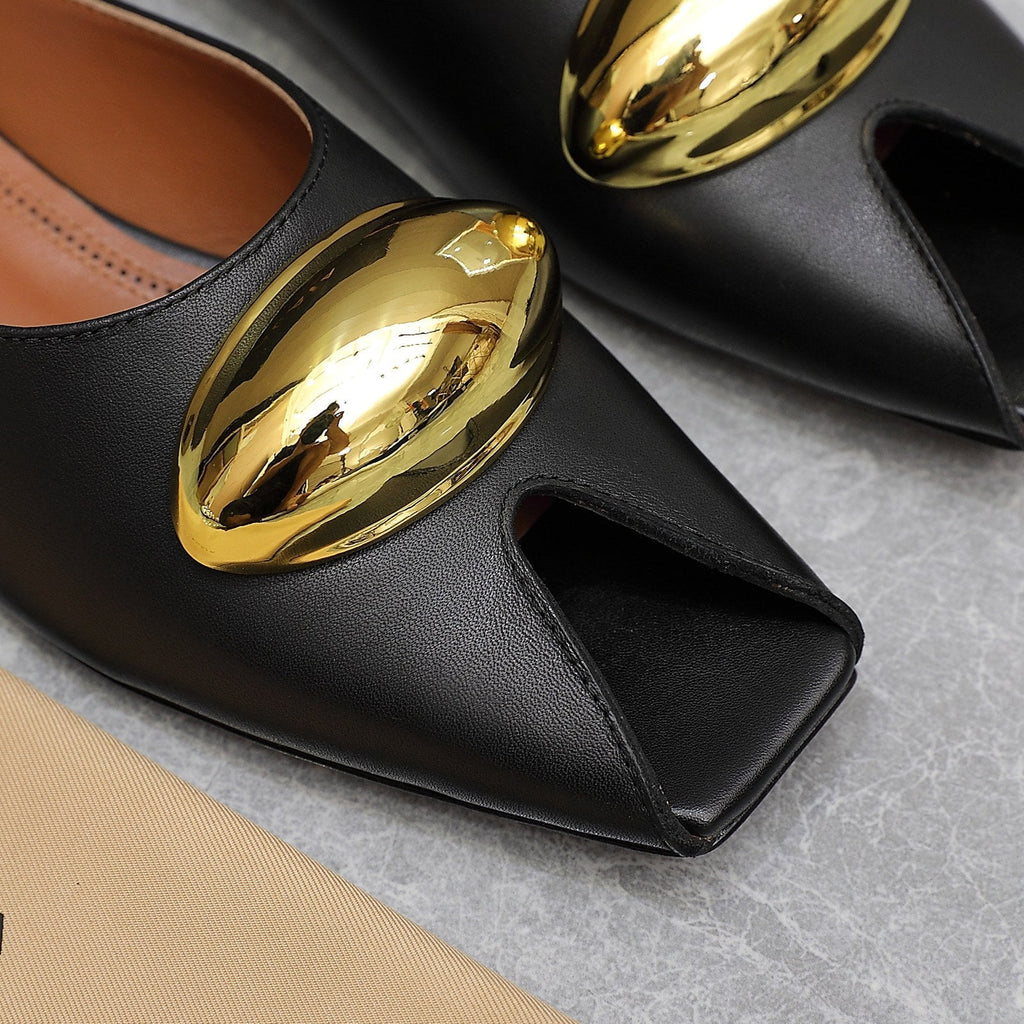 ALAIA FLAT MULE IN BLACK LAMBSKIN WITH GOLD HARDWARE