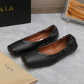ALAIA BALLET FLATS IN BLACK SMOOTH CALFSKIN
