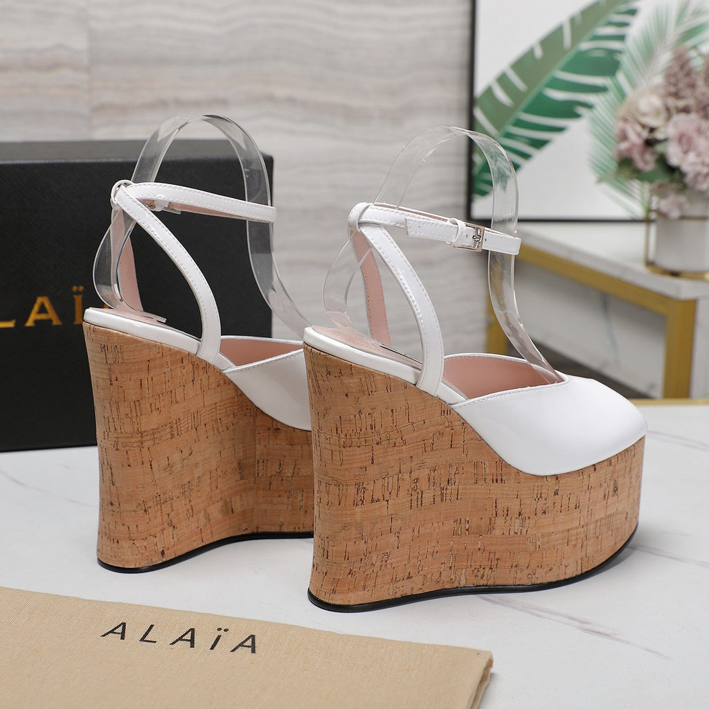 ALAIA WEDGE SANDAL IN WHITE GLOSSY CALFSKIN AND BEIGE RUBBER