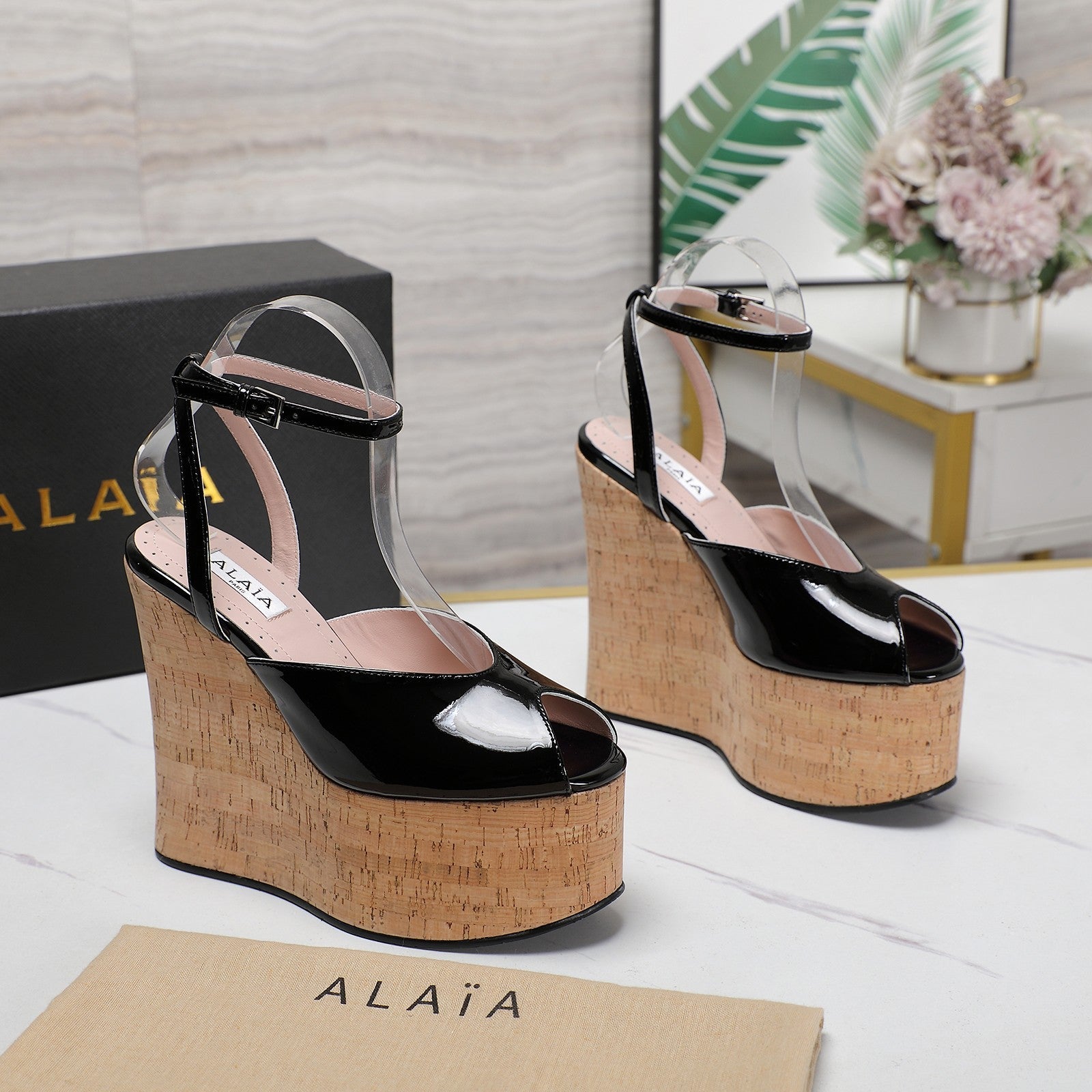 ALAIA WEDGE SANDAL IN BLACK GLOSSY CALFSKIN AND BEIGE RUBBER