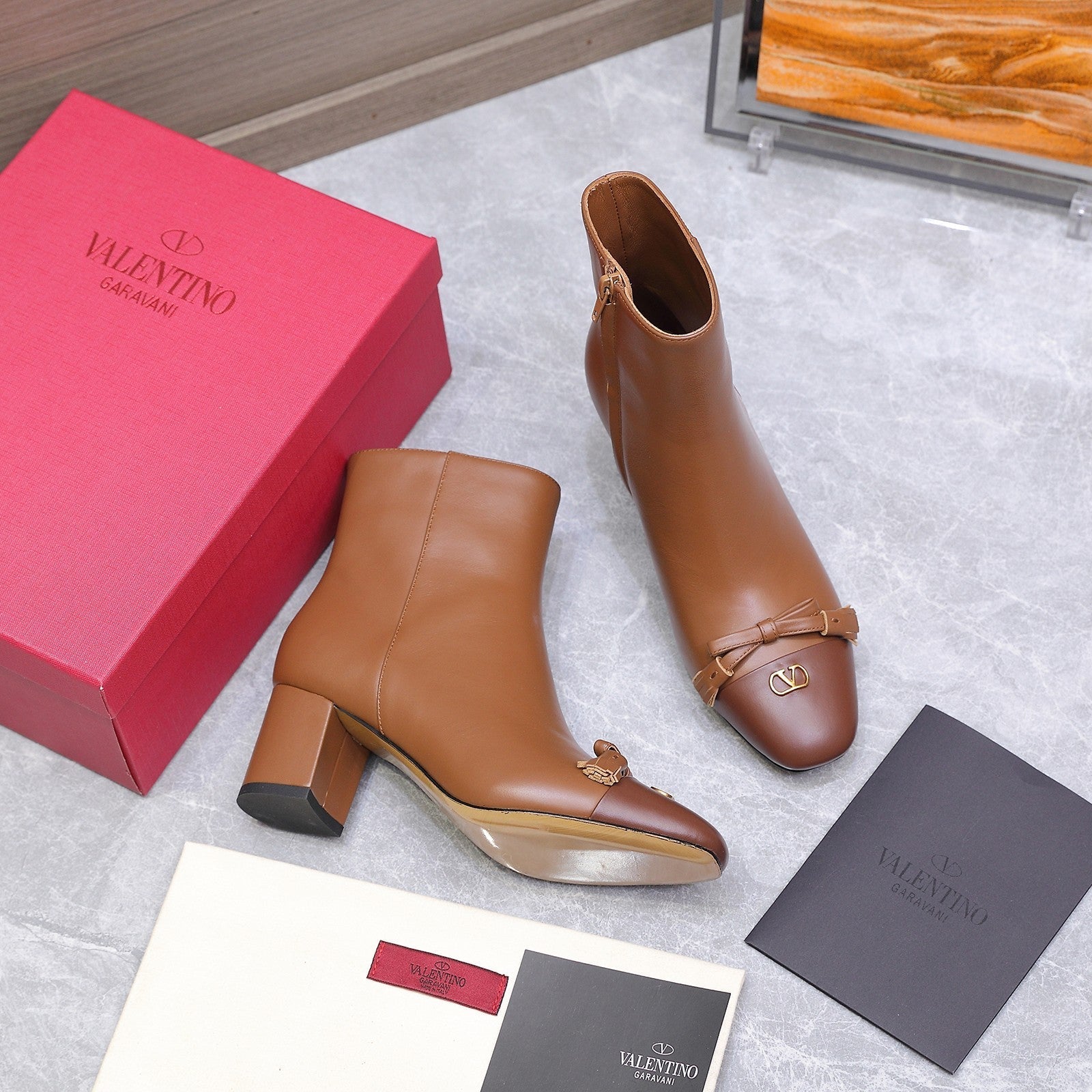 VALENTINO 25S VALET DU ROI ANKLE BOOTS 60 MM IN BROWN CALFSKIN WITH BOW