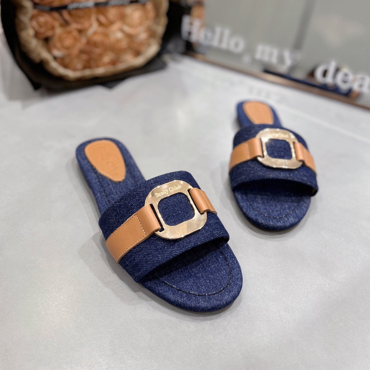 CHLOÉ SLIDE MULE IN NAVY BLUE DENIM AND BROWN CALFSKIN GOLD HARDWARE
