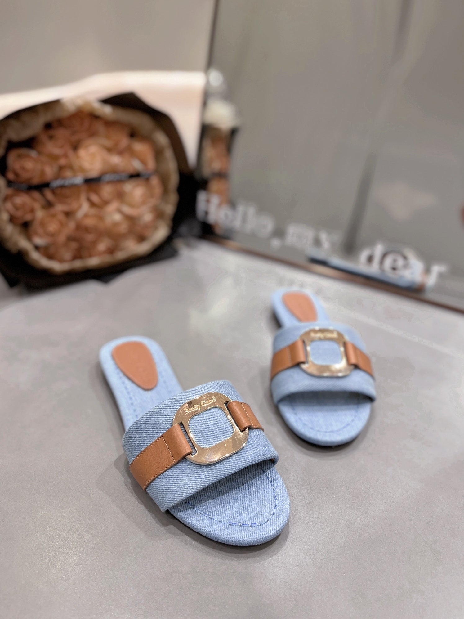 CHLOÉ SLIDE MULE IN LIGHT BLUE DENIM AND BROWN CALFSKIN GOLD HARDWARE