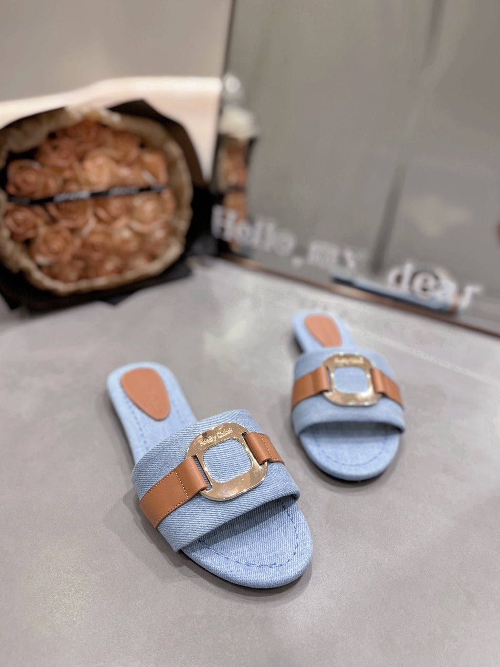 SLIDE MULE IN LIGHT BLUE DENIM AND BROWN CALFSKIN GOLD HARDWARE