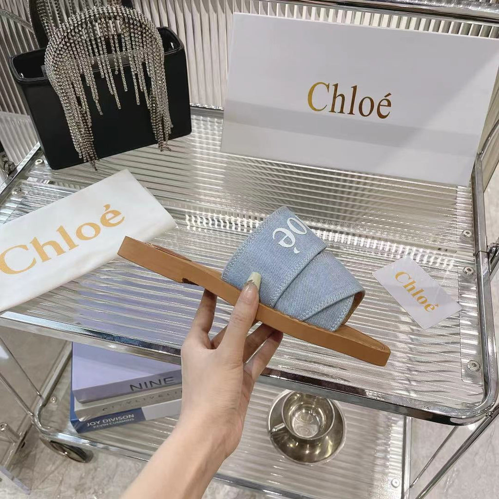CHLOÉ WOODY MULE IN LIGHT BLUE DENIM WITH WHITE LOGO