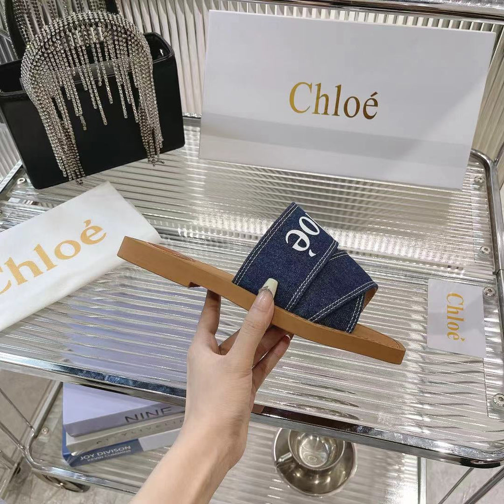 CHLOÉ WOODY MULE IN NAVY BLUE DENIM WITH WHITE LOGO