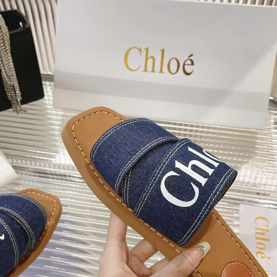 CHLOÉ WOODY MULE IN NAVY BLUE DENIM WITH WHITE LOGO