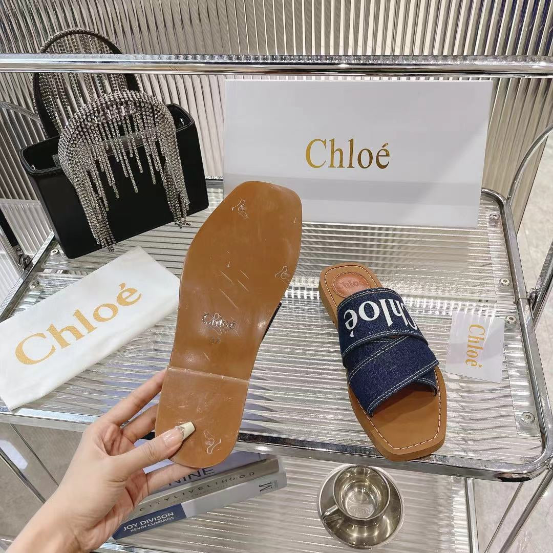 CHLOÉ WOODY MULE IN NAVY BLUE DENIM WITH WHITE LOGO
