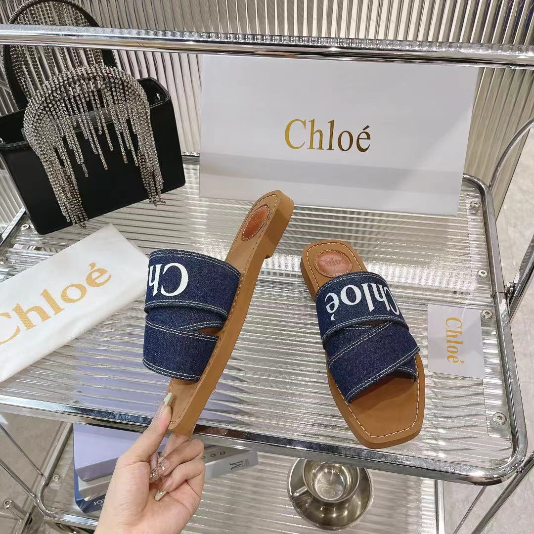 CHLOÉ WOODY MULE IN NAVY BLUE DENIM WITH WHITE LOGO