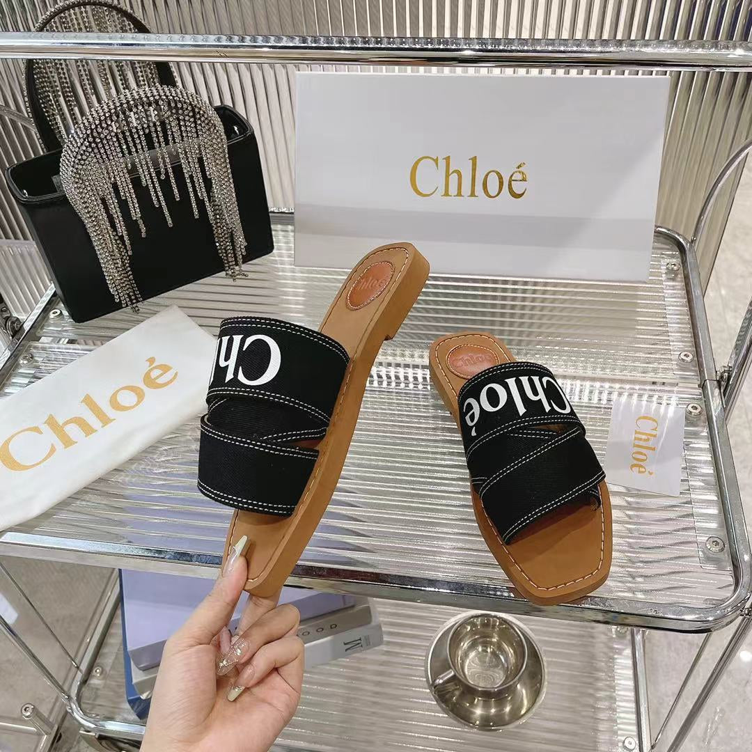CHLOÉ WOODY MULE IN BLACK DENIM WITH WHITE LOGO