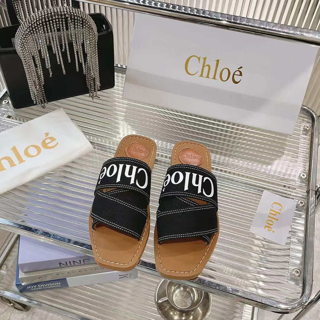 CHLOÉ WOODY MULE IN BLACK DENIM WITH WHITE LOGO