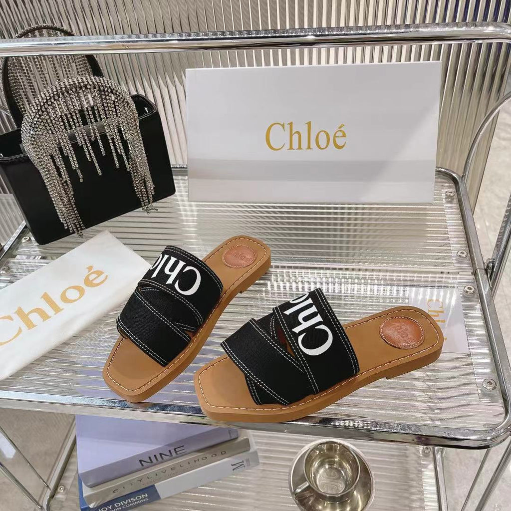 CHLOÉ WOODY MULE IN BLACK DENIM WITH WHITE LOGO