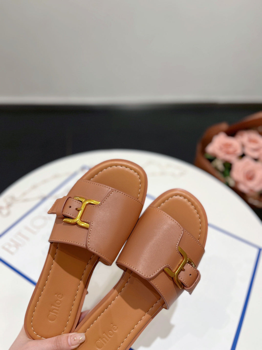 MARCIE SLIDE IN BRONZE BROWN CALFSKIN WITH GOLD HARDWARE