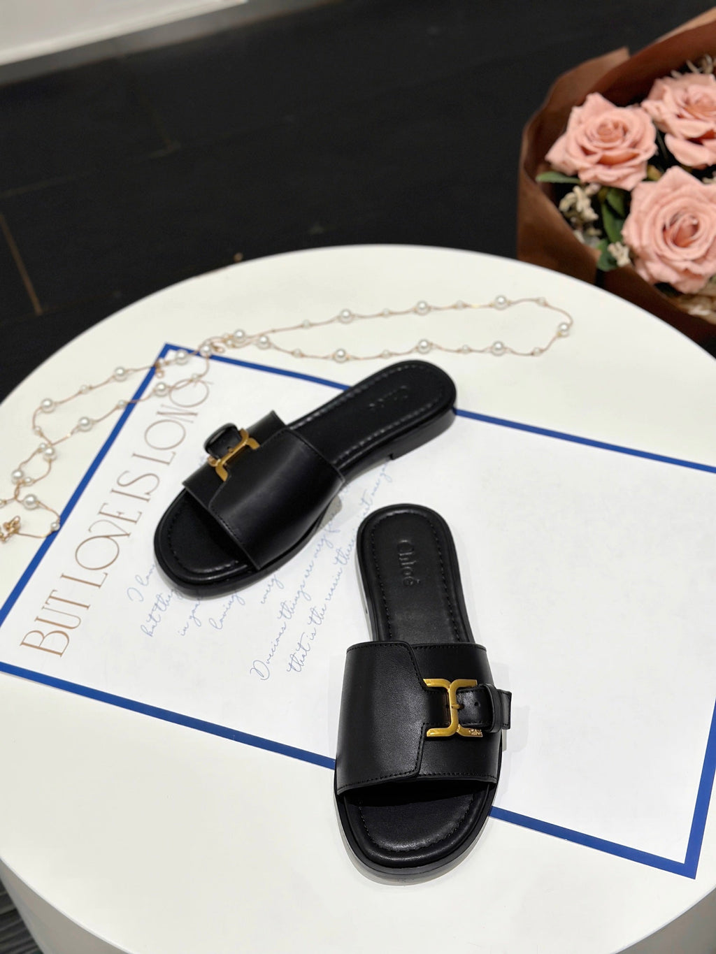 MARCIE SLIDE IN BLACK CALFSKIN WITH GOLD HARDWARE