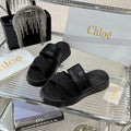 CHLOÉ MILA FLAT SLIDES 5 CM IN BLACK CALFSKIN AND RE-NYLON