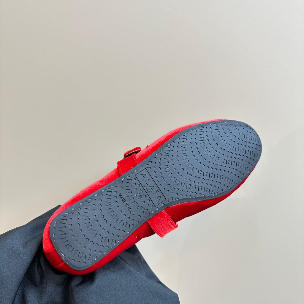 ALAIA BALLET FLATS IN CHERRY RED VELVET