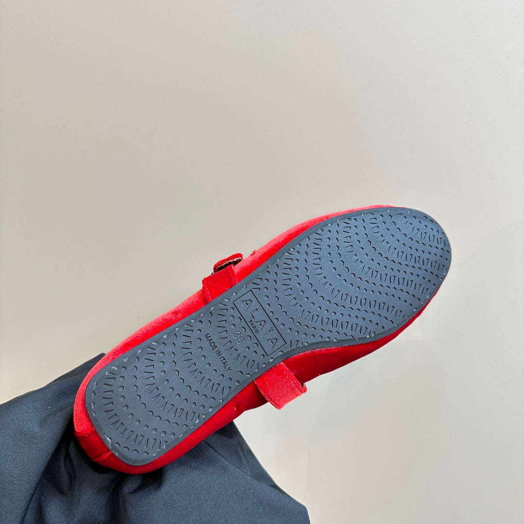 ALAIA BALLET FLATS IN CHERRY RED VELVET