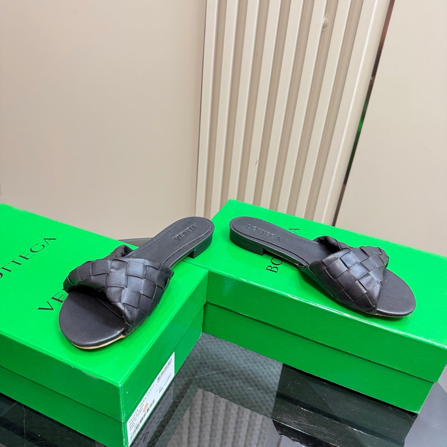 BLINK FLAT MULE IN BLACK INTRECCIATO LEATHER