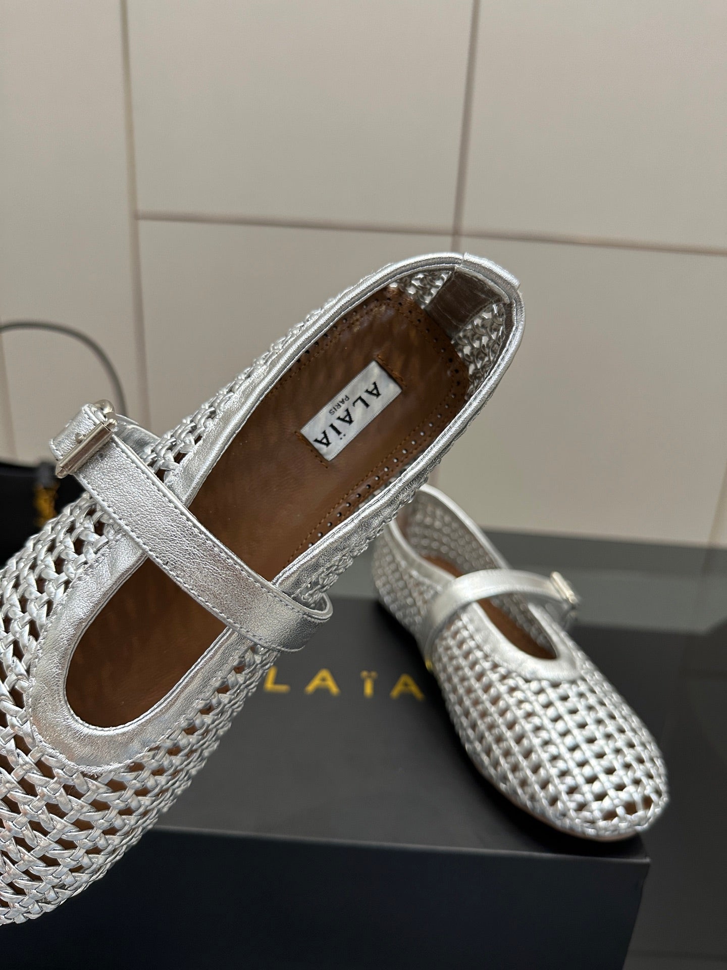 ALAIA MARY JANE FLAT 25S IN SILVER WOVEN MESH