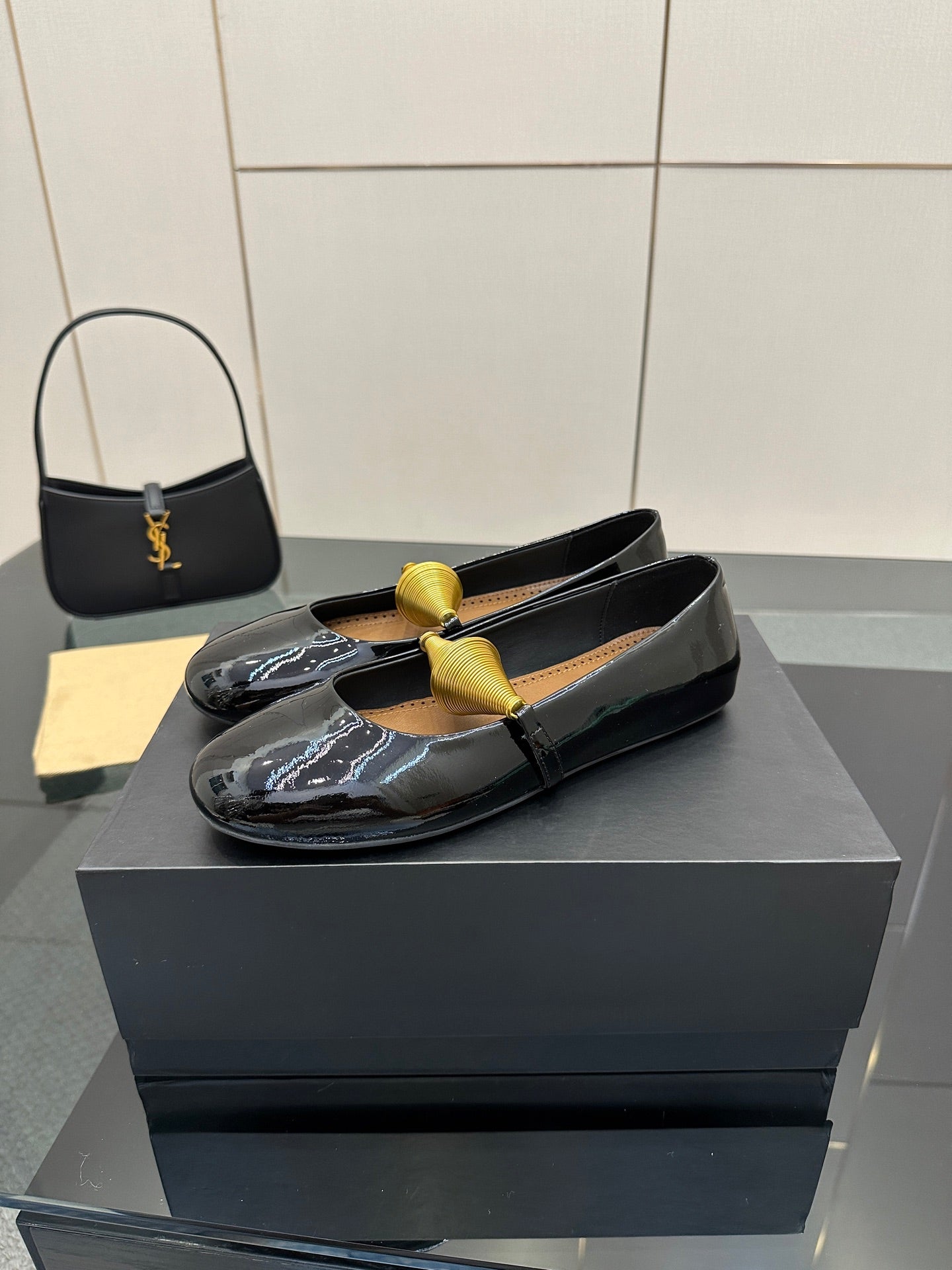 ALAIA BALLET SHOES 25S IN BLACK PATENT LEATHER WITH GOLD HARDWARE