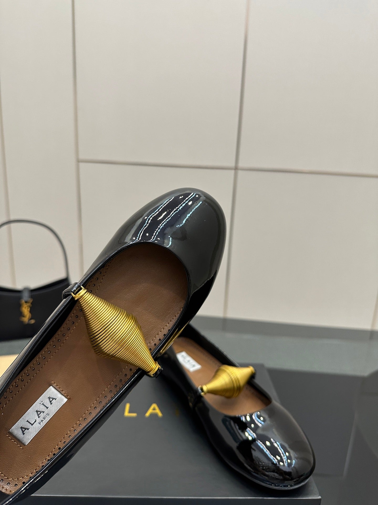 ALAIA BALLET SHOES 25S IN BLACK PATENT LEATHER WITH GOLD HARDWARE