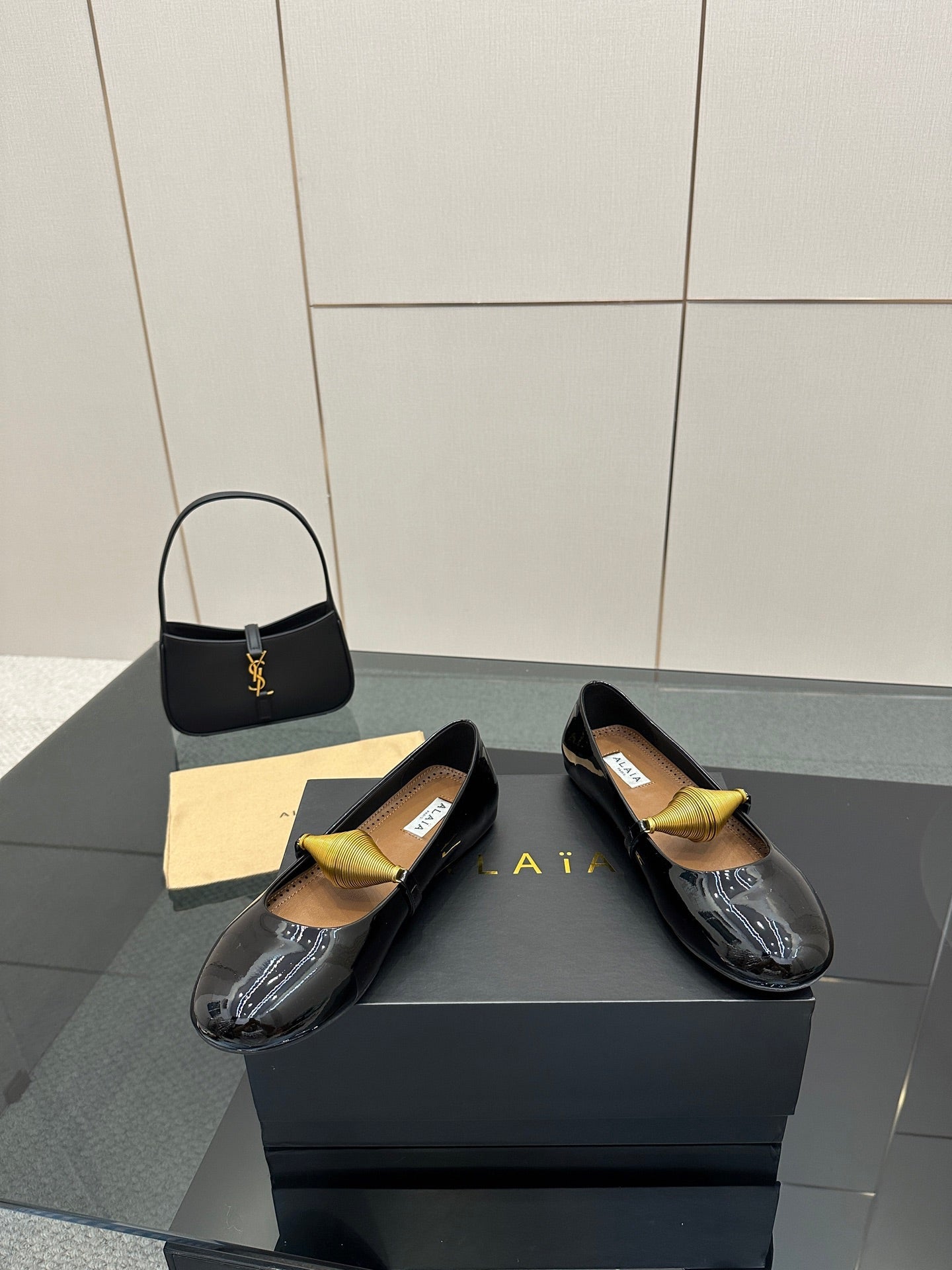 ALAIA BALLET SHOES 25S IN BLACK PATENT LEATHER WITH GOLD HARDWARE