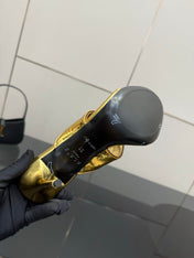 ALAIA HEELED THONG 25S IN GOLD PATENT LEATHER