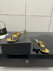 ALAIA HEELED THONG 25S IN GOLD PATENT LEATHER