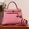 KELLY SELLIER 25 BAG IN SALMON PINK OSTRICH LEATHER WITH GOLD HARDWARE