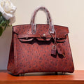 KELLY SELLIER 25 BAG IN BERRY RED OSTRICH LEATHER WITH GOLD HARDWARE