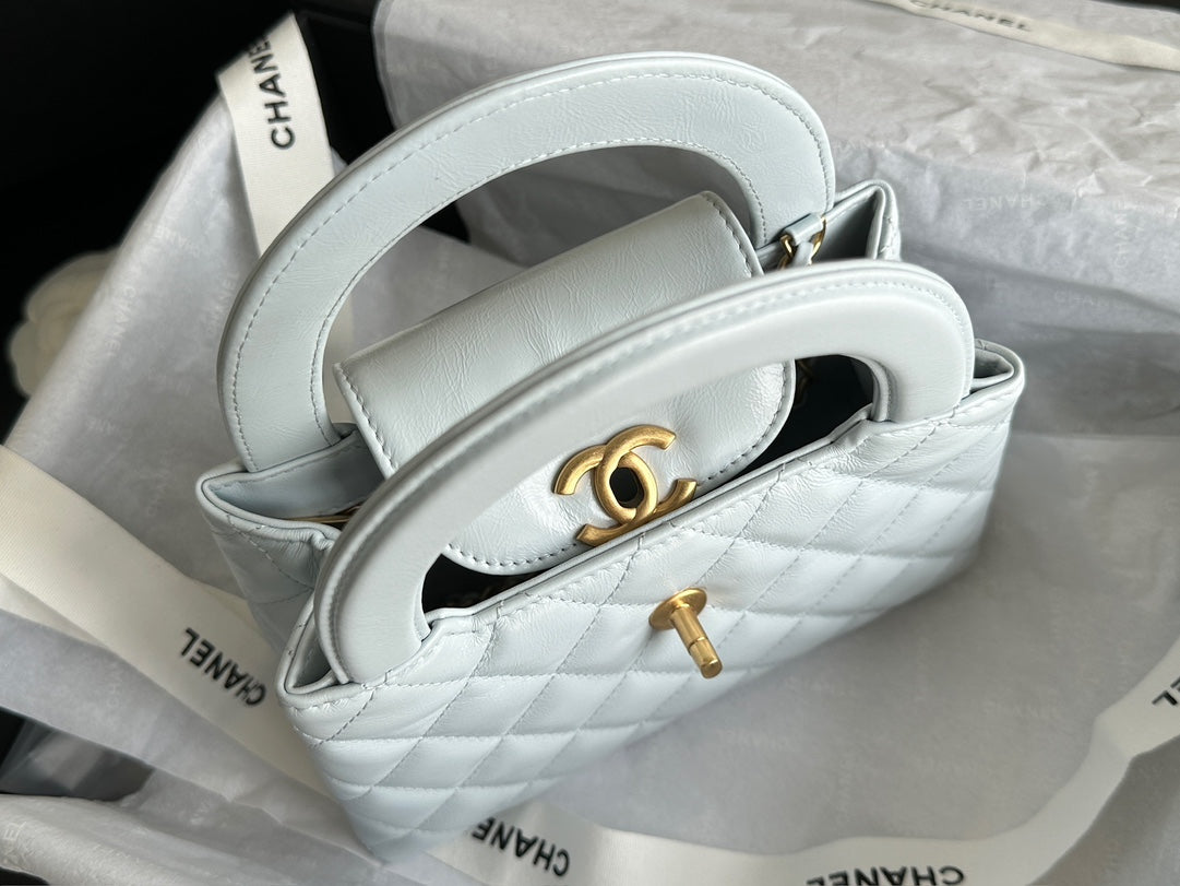 CHANEL VINTAGE KELLY 25S 19 CM IN PASTEL MINT GREEN LAMBSKIN WITH GOLD HARDWARE