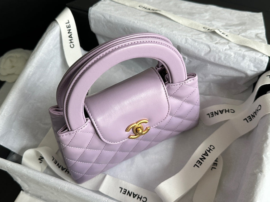 CHANEL VINTAGE KELLY 25S 19 CM IN PURPLE LAMBSKIN WITH GOLD HARDWARE