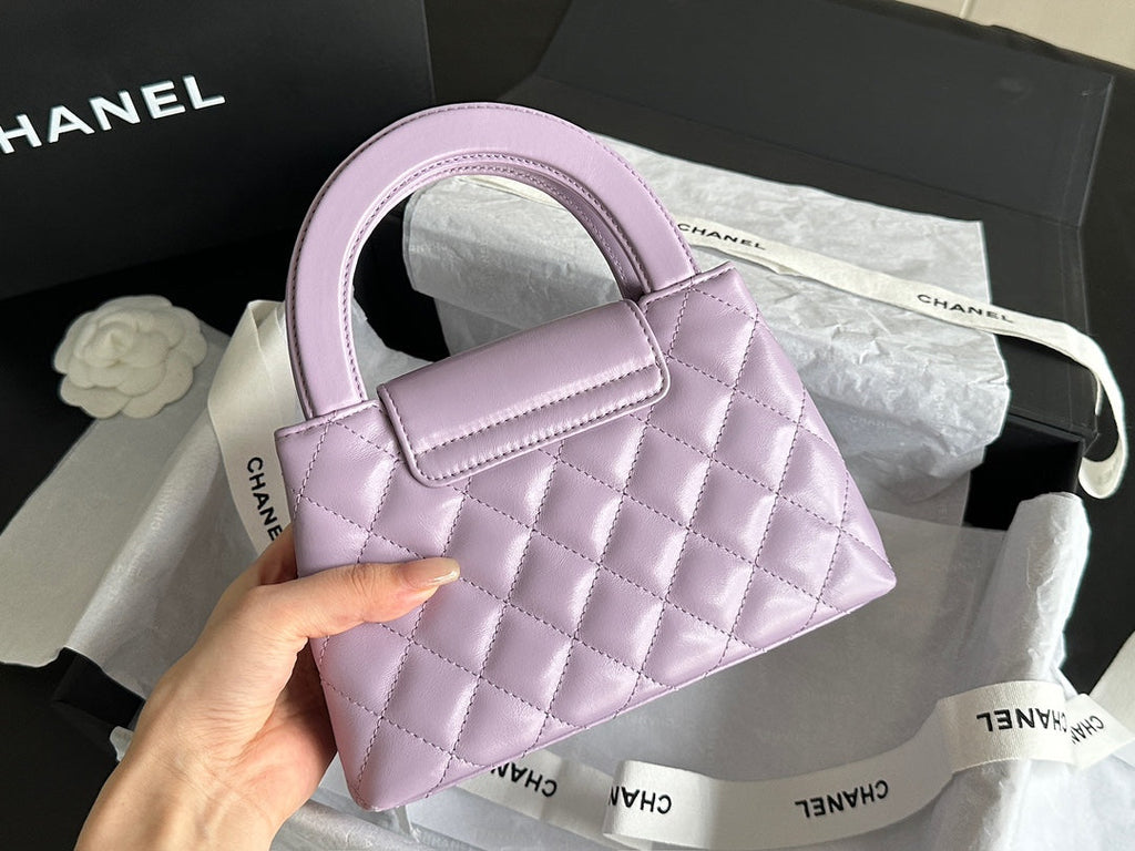 CHANEL VINTAGE KELLY 25S 19 CM IN PURPLE LAMBSKIN WITH GOLD HARDWARE