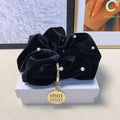 SCRUNCHIE EMBELLISHED PEARL IN BLACK VELVET GOLD TAG LOGO 136817