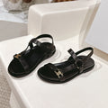 MAUD SANDAL WITH TRIOMPHE IN BLACK CALFSKIN