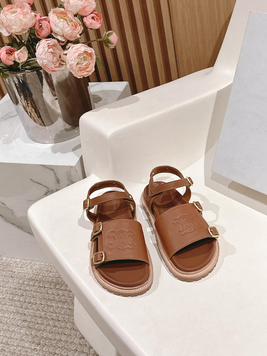 FLAT SANDALS IN RUST BROWN TRIOMPHE EMBOSSED SMOOTH CALFSKIN