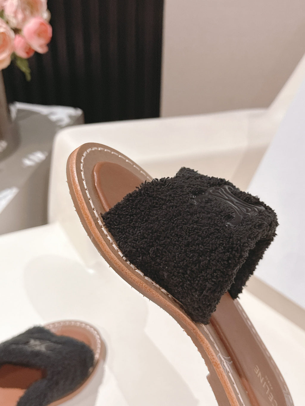 CELINE 25S LYMPIA TWISTED SANDAL IN BLACK SPONGE FABRIC