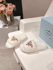 PRADA 25S FLAT MULES IN WHITE RABBIT FUR